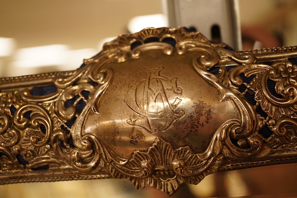 A large late Victorian repousse pierced silver mounted rectangular mirror, Henry Matthews, Birmingham, 1898, 37.4cm by 42.4cm.